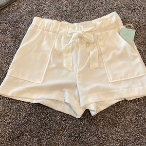 Brand NEW with tags. Dressy shorts, SZ Medium